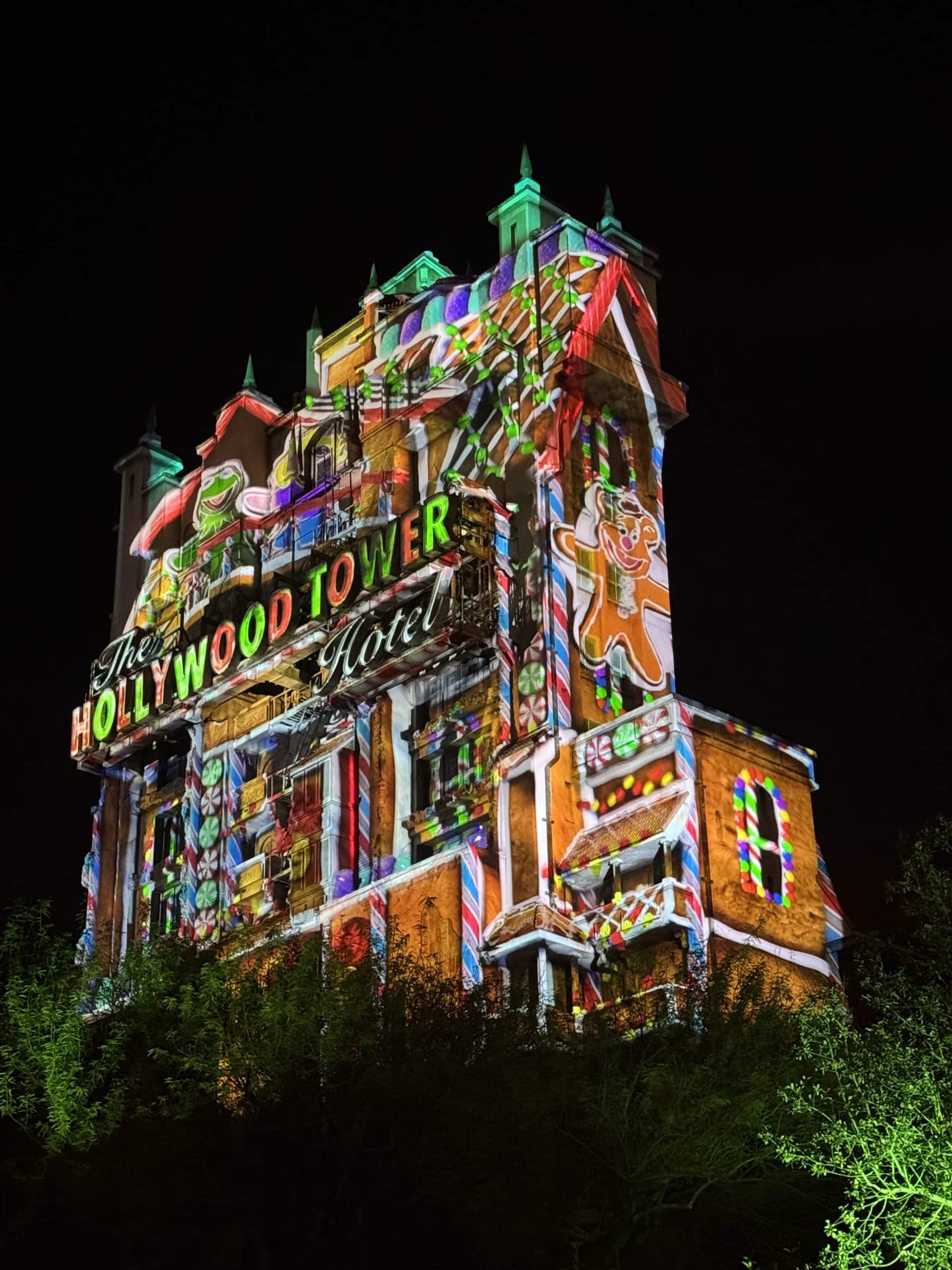 Christmas gingerbread house projection overlay of Tower of Terror at Hollywood Studios