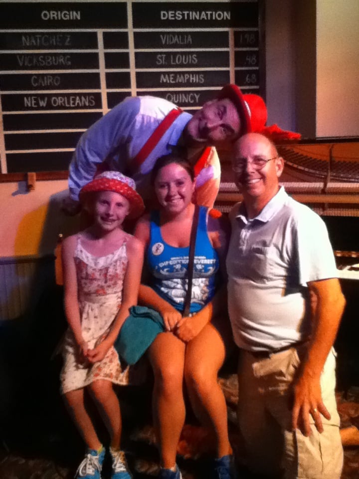 family photo with Bob Jackson at the River Roost Lounge in Port Orleans Riverside